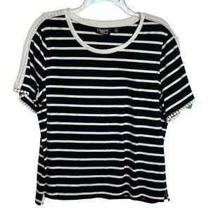 Onque black and white striped shirt. Sz-L. White lattice and pom-poms on sleeves